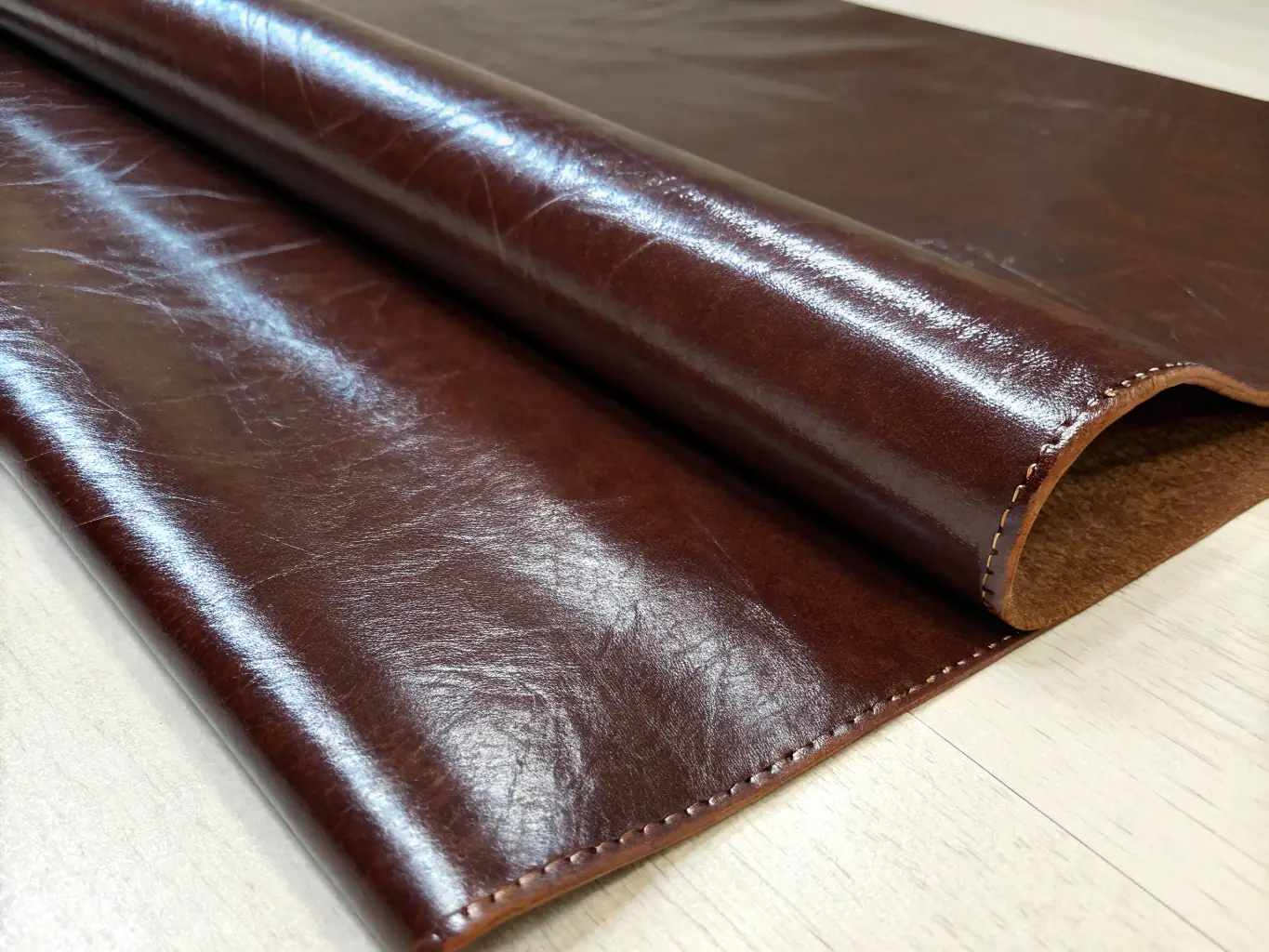 A detailed image showcasing the texture and grain of full-grain leather used in Satlayer's Luxury Leather collection, highlighting its natural beauty and durability.